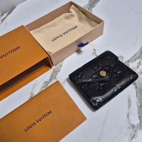 (정품) 루이비통 앙프렝뜨 조에 월릿 반지갑