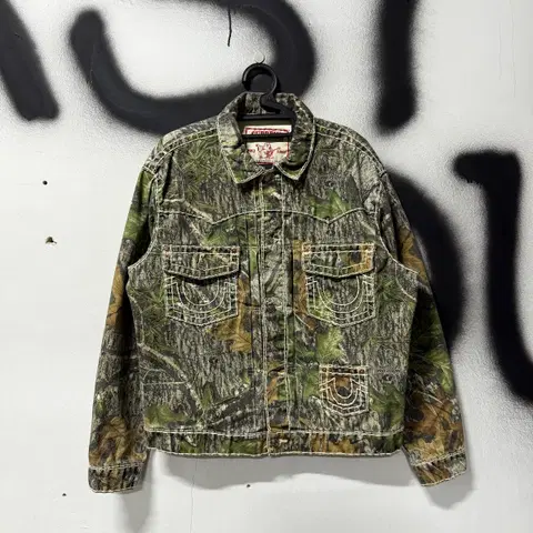 FW21 슈프림 x 트루릴리전 모시 오크 카모 데님 트러커 자켓