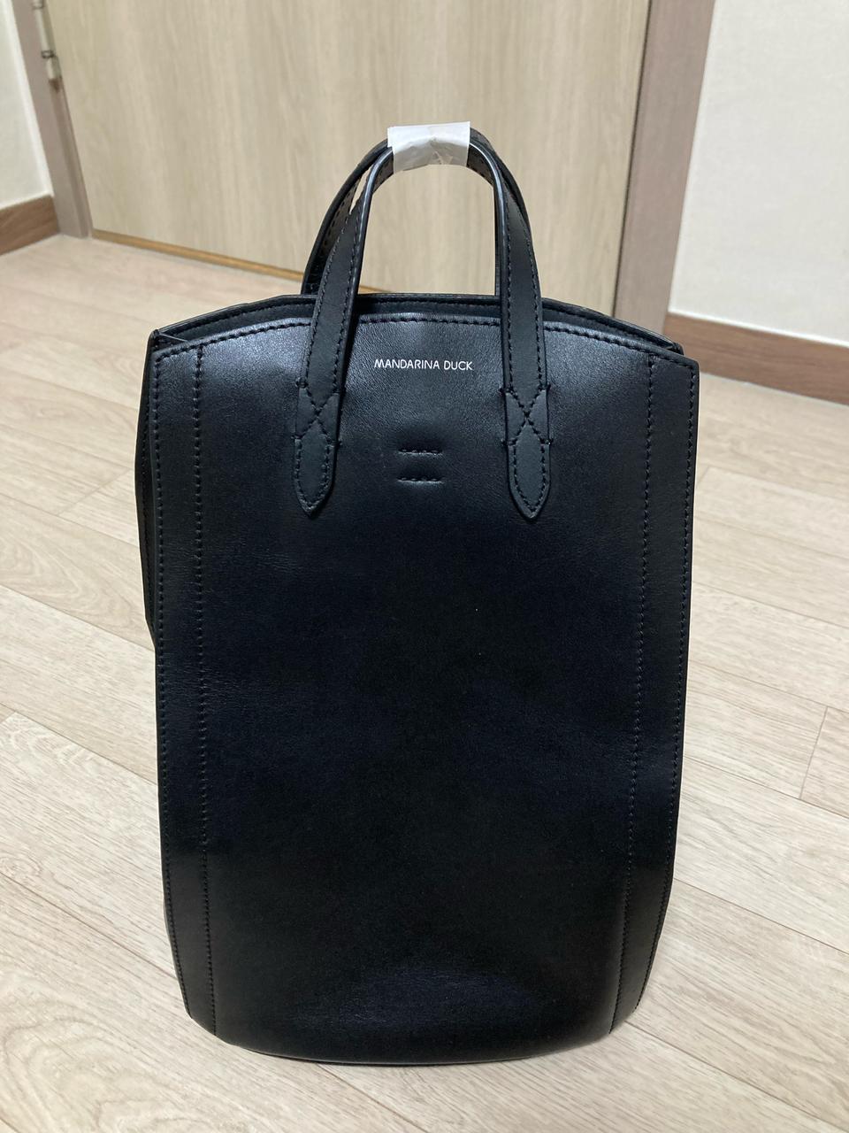 만다리나덕 가죽 백팩 판매