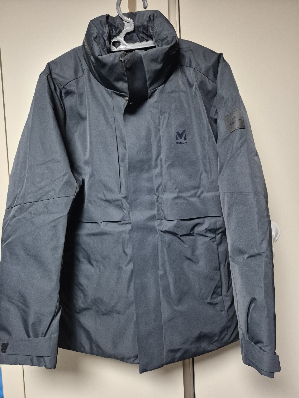 밀레 골프 정품 오리털 경량패딩 110사이즈 팝니다