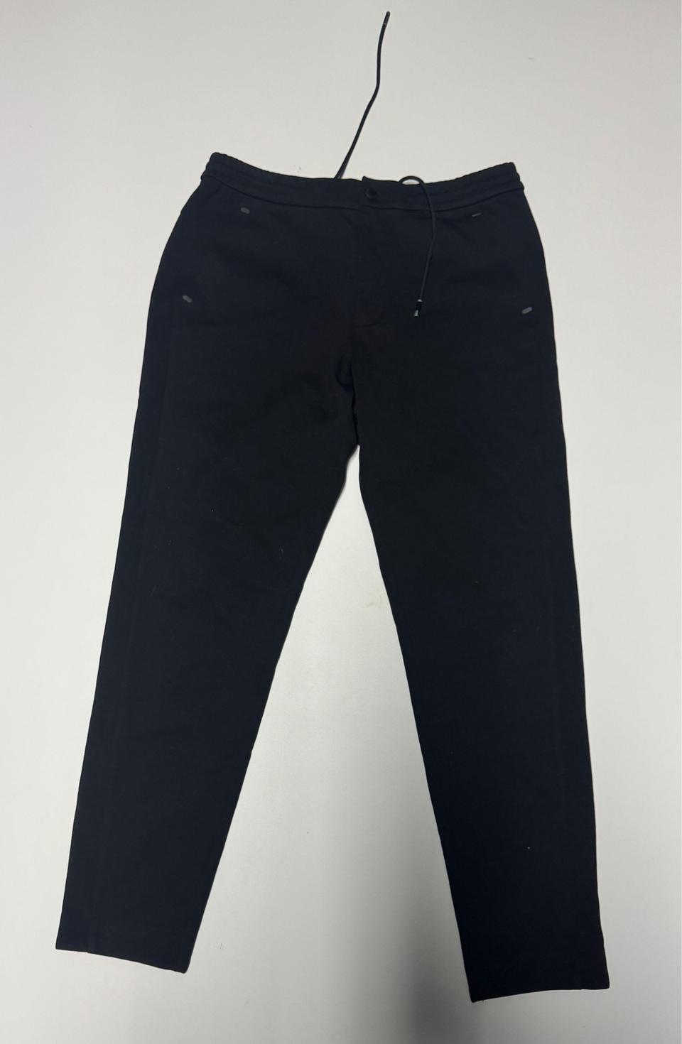 디스커버리 트레이닝 팬츠 블랙 31.4인치