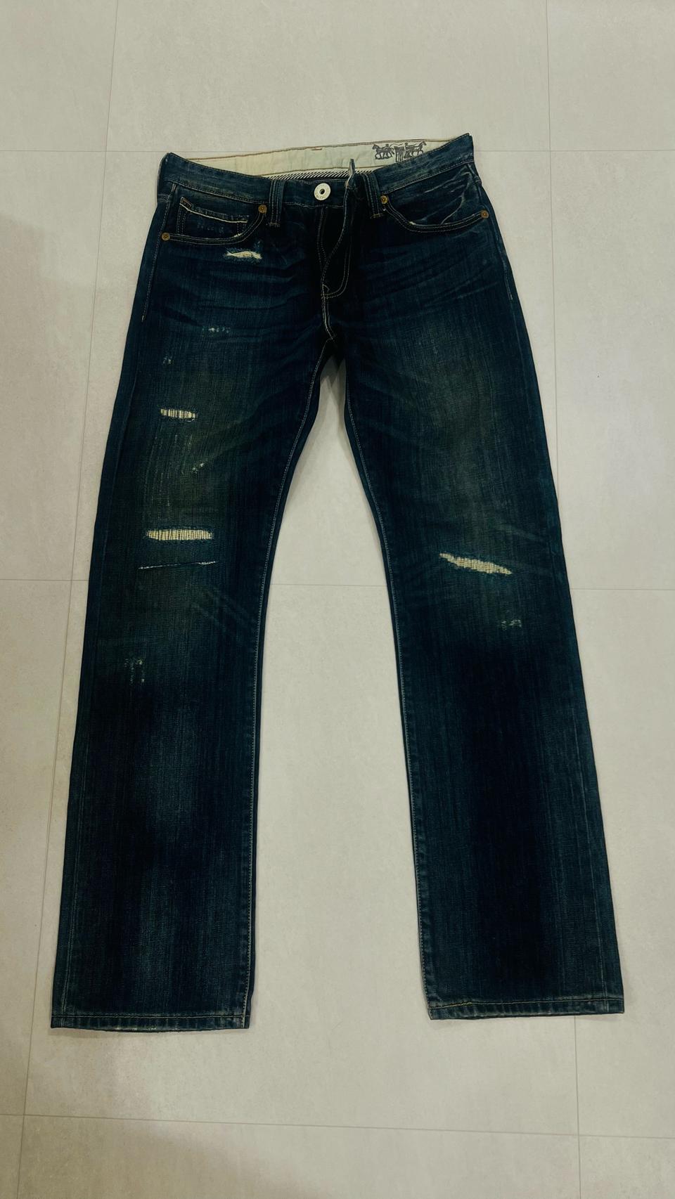 리바이스 523 워싱 청바지