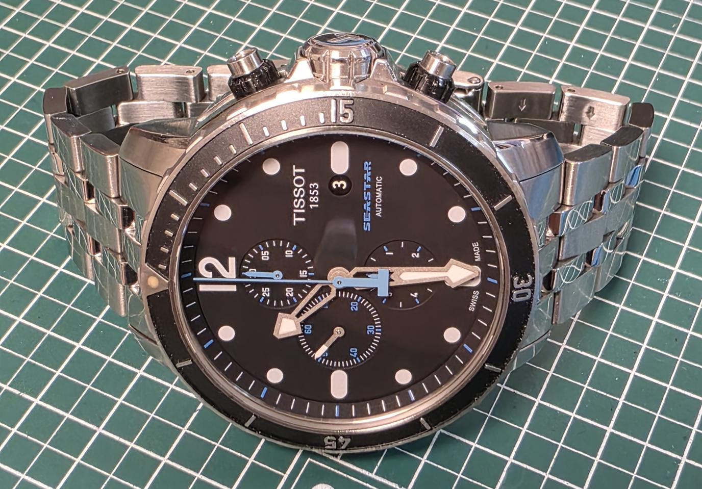 티쏘 (TISSOT) 씨스타1000 오토메틱 크로노그래프 블랙 메탈시계